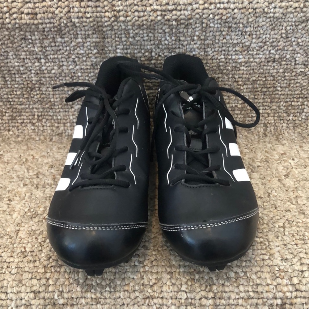 Adidas baseball cleats.